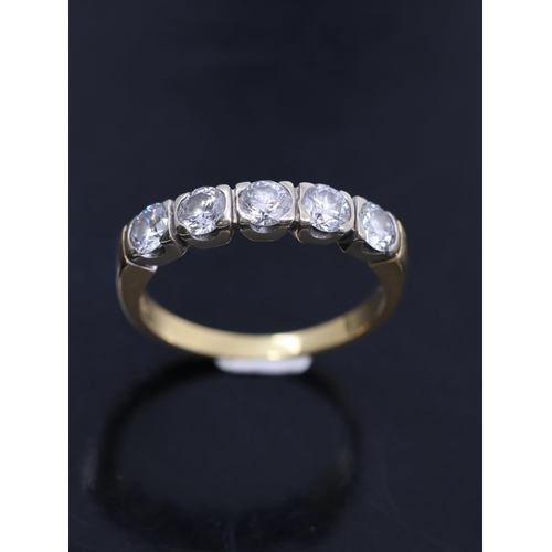 161 - A diamond set five stone ring in 18ct gold finger size N