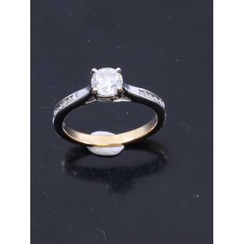 17 - A diamond solitaire ring set with diamond shoulders finger size I Half, estimated weight of main dia... 