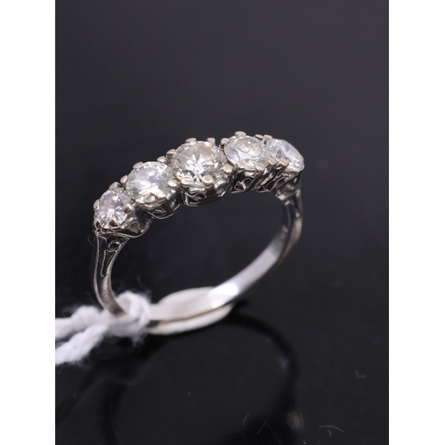 180 - A diamond five stone ring set in 18ct gold finger size M half