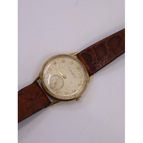 187 - A gents IWC 18ct gold wrist watch