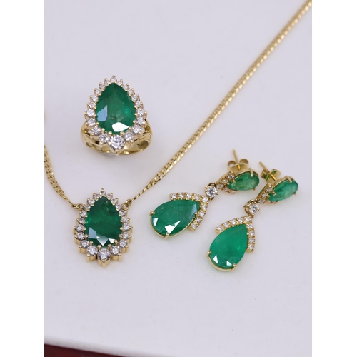 208 - A ladies emerald and diamond ring, necklet and earring suite