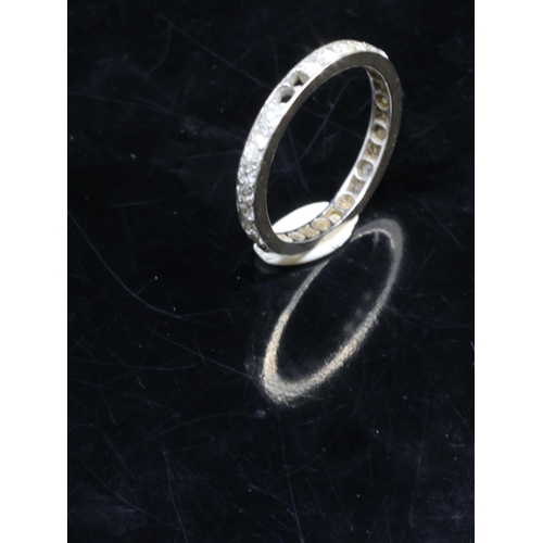 22 - A diamond set full eternity ring finger size L, (we note two diamonds are missing and also one is la... 