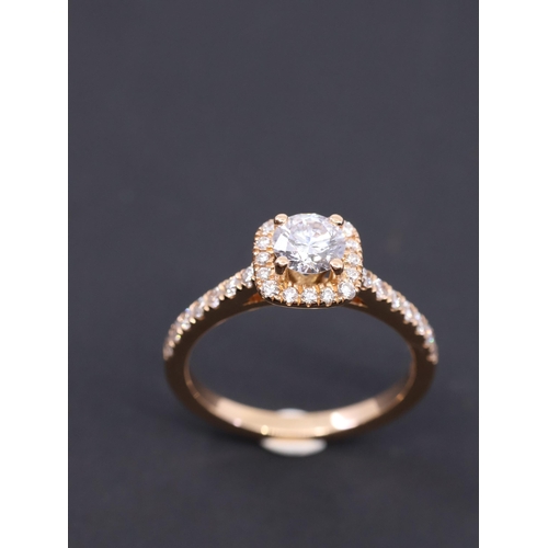 27 - A diamond cluster ring set in 18ct gold , with a cert which states the weight as 0.55cts + 0.41cts t... 