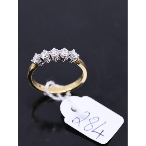 284 - A diamond 5 stone 18ct gold ring, showing as finger size T