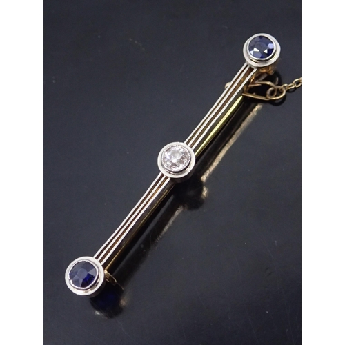 3 - A diamond and sapphire three stone bar brooch, length 2 inches, approx. 4.6 grams