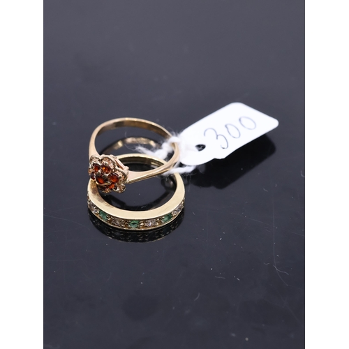 300 - Two gold rings, finger size N and O