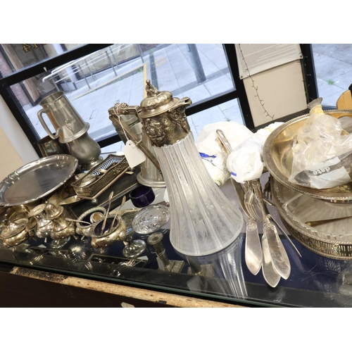 370 - A large collection of silver plated ware, including a musical car decanter set, and a small silver b... 