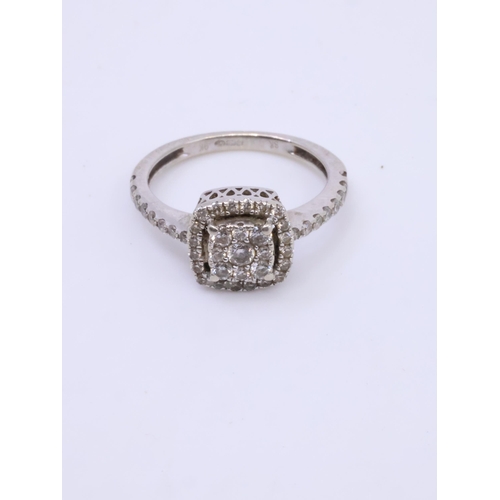 44 - A diamond cluster ring set in 9ct gold, finger size G approx. 1.8 grams (note one diamond missing)