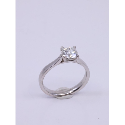 56 - A diamond solitaire ring with a copy of a GIA certificate which states the diamond is 0.96cts F colo... 