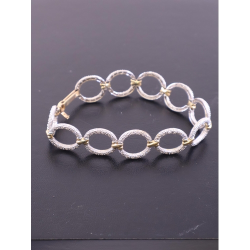 66 - A diamond set 14kt gold bracelet approx. 19.6 grams