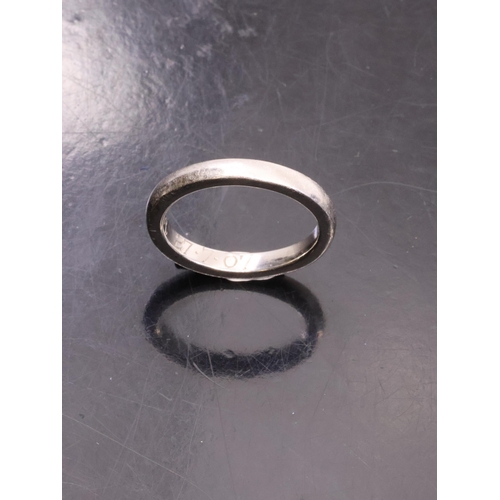 105 - A platinum wedding band approx. 5.2 grams finger size J half