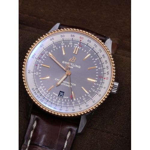 239 - A Breitling wrist watch in box, and a valuation from Paul Sheeran which states its is one gents Brei... 