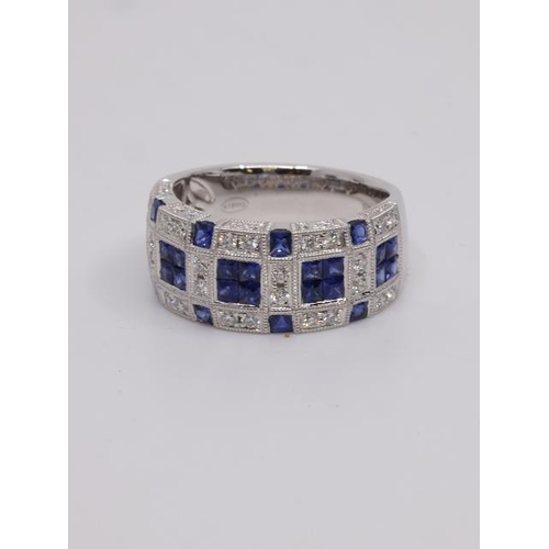 26 - A diamond and sapphire cluster ring, estimated total weight of sapphires 1.46cts and diamonds 0.50ct... 