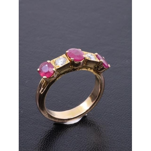 38 - A diamond and ruby five stone ring finger size P