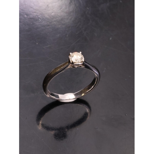 59 - A diamond solitaire ring set in 9ct gold, estimated weight of diamond 0.25cts, showing as finger siz... 