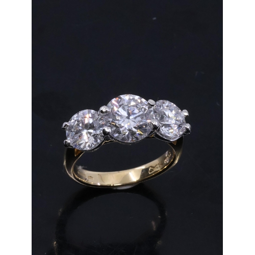 199 - A lab grown diamond three stone ring  with three HRD certificates which states 2.52 cts D colour VVS... 