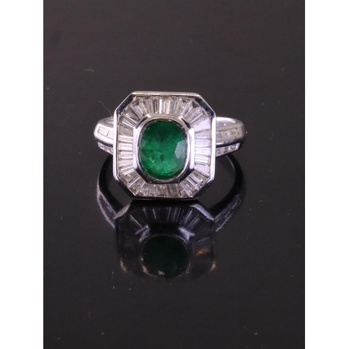 206 - A fine emerald and diamond cluster ring set in 18ct gold, total estimated weight of emerald 1.50cts ... 