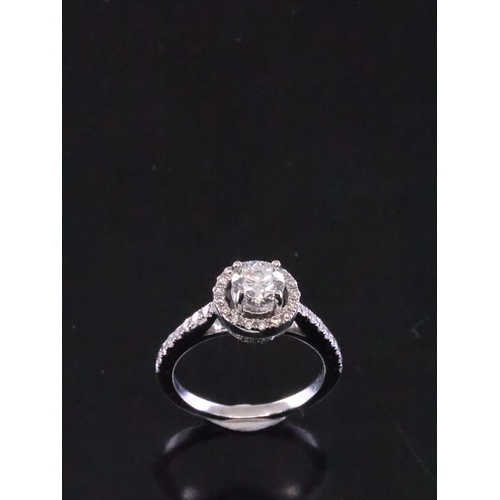 108 - An 18ct gold solitaire ring halo style approx. 3.3 grams finger size G half