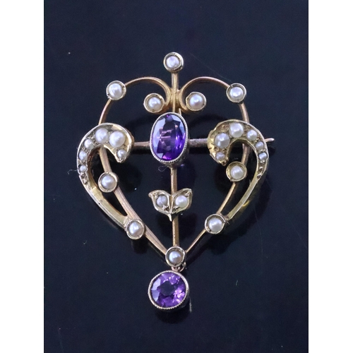 115 - An amethyst and pearl brooch/pendant set in 9ct gold