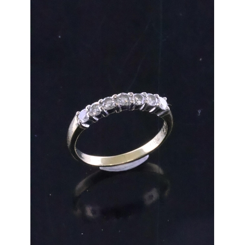 128 - A diamond set 18ct gold ring finger size L