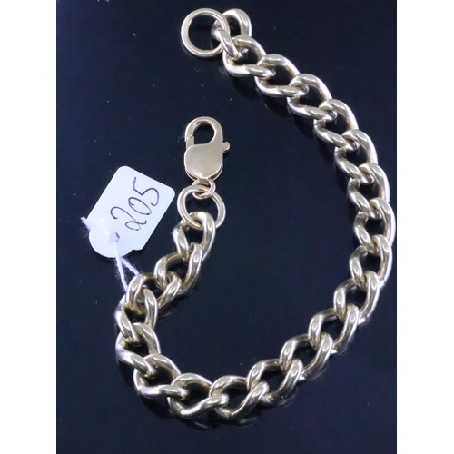 205 - A gold curb bracelet approx. 58.7 grams