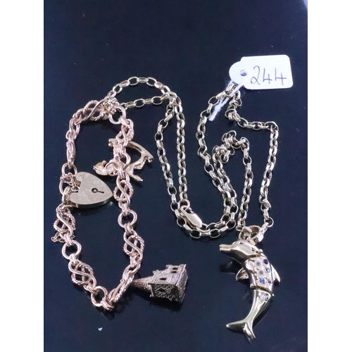 244 - A gold pendant and chain and a gold charm bracelet, total weight approx. 36.8 grams