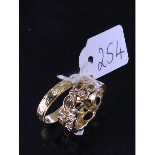 254 - A 14ct gold band ring with diamonds and an 18ct gold band ring, approx. 8.3 grams finger size N & P