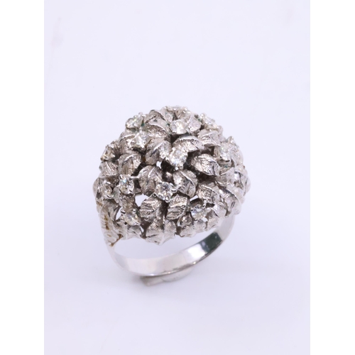 29 - A diamond set cluster ring (rhodium plated) approx. 8.6 grams finger size N