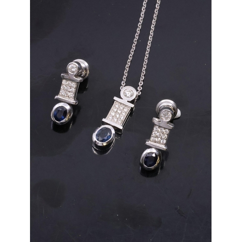 38 - A pair of sapphire and diamond cluster pendant and earrings set in 18ct gold, approx. 9 grams, with ... 