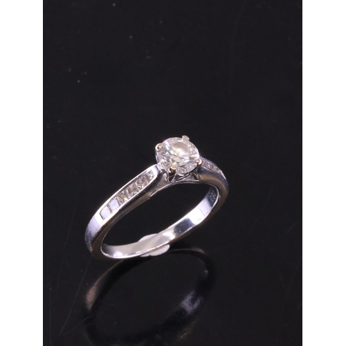 59 - A diamond solitaire ring set in 18ct gold finger size L and a half