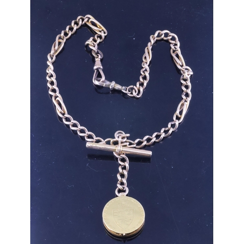 66 - A 9ct gold albert chain with a fob approx. 55 grams