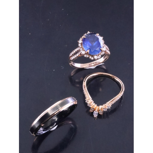 82 - A sapphire and diamond cluster ring with a copy of a receipt from Fields which states €950 was paid ... 