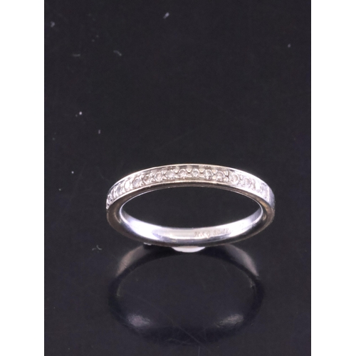 85 - An diamond set half eternity ring finger size L, with a copy of valuation which states an insurance ... 