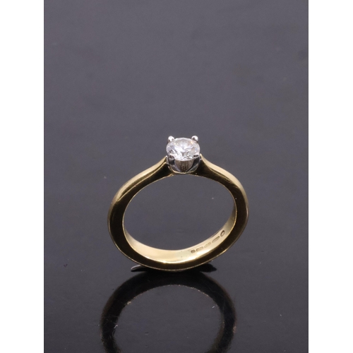 18 - A diamond single stone ring set in 18ct gold approx. 3.8 grams finger size G half to H