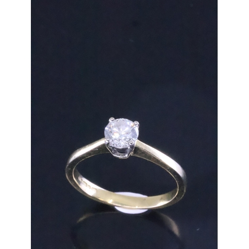 200 - A diamond solitaire ring estimated weight of diamond 0.60cts in 18ct gold finger size M half