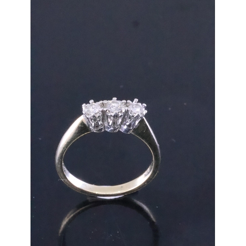 207 - A three stone diamond 9ct gold ring approx. 2.9 grams finger size N