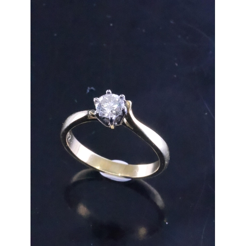 227 - A diamond solitaire ring set in 18ct gold finger size L estimated weight of diamond 0.35cts with a c... 