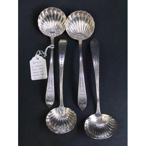 301 - Four Irish Silver Shell Bowl Bright Cut Sauce Ladles Dublin 1785 (3) & 1788 (1) total weight approx.... 