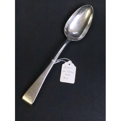 308 - An Irish silver hookend rattail serving spoon Dublin 1813 by Richard Williamson, retailed by M West ... 