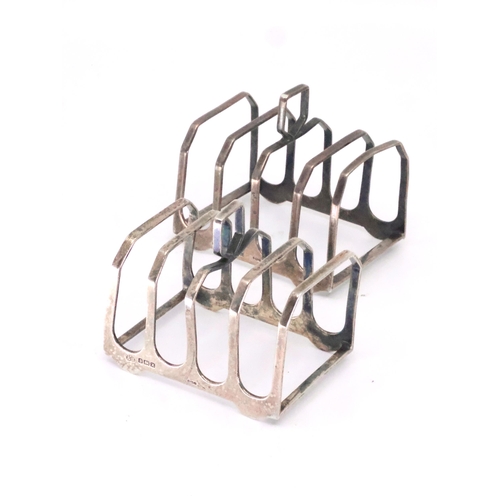 319 - A pair of silver toast racks approx. 112 grams Birmingham 1947