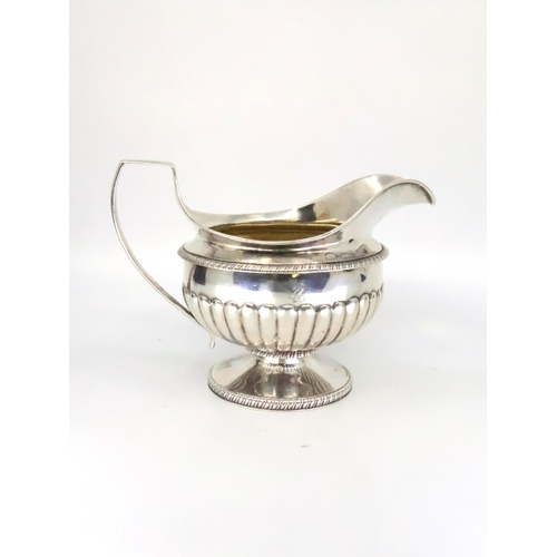 324 - A Geo III silver cream jug Edinburgh 1805 by Cunningham & Simpson approx. 262 grams