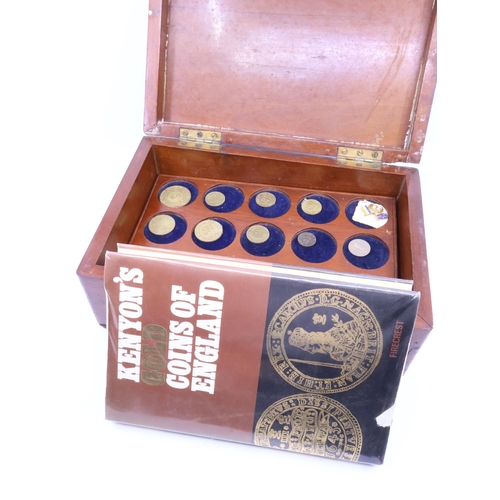 358 - A collection of coins in a wooden box & book