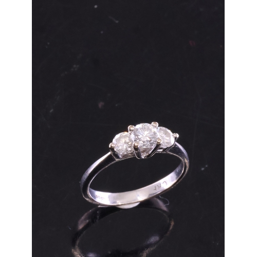 37 - An 18ct gold diamond three stone ring finger size J approx. 2.4 grams