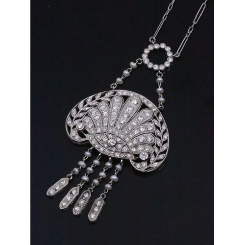 63 - A fine diamond & pearl set necklace with a copy of an insurance valuation which states it is set in ... 