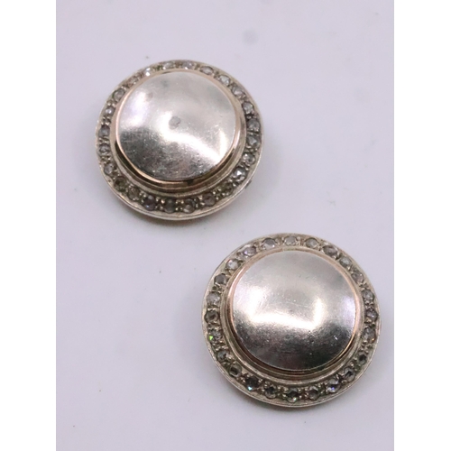 74 - A pair of 12kt gold & white metal clip on earrings set with diamonds, total weight approx. 19 grams