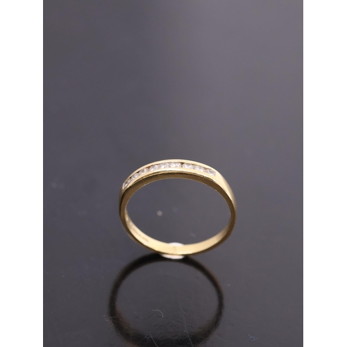 1 - A diamond half eternity ring set in 18ct gold with a copy of a valuation  dated 1998 from Paul Sheer... 
