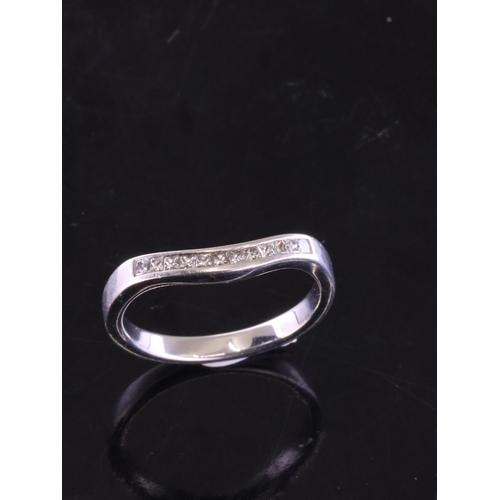 10 - A diamond set half eternity ring set in platinum approx. 4 grams finger size L