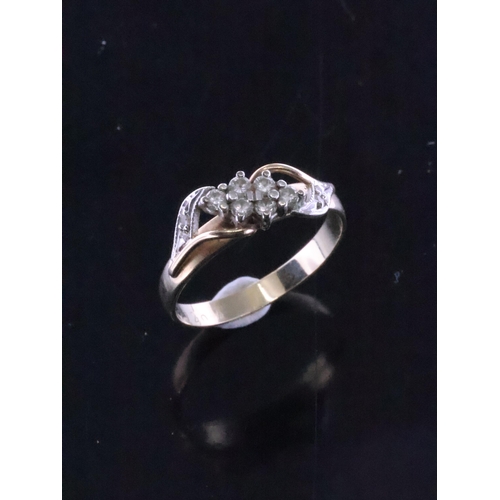 14 - A diamond set gold ring finger size M set in 9ct gold approx. 2.2 grams