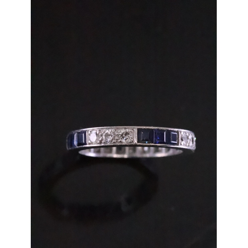 27 - A diamond and sapphire full eternity ring finger size O