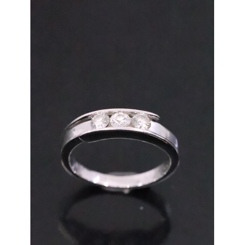 36 - A diamond three stone ring